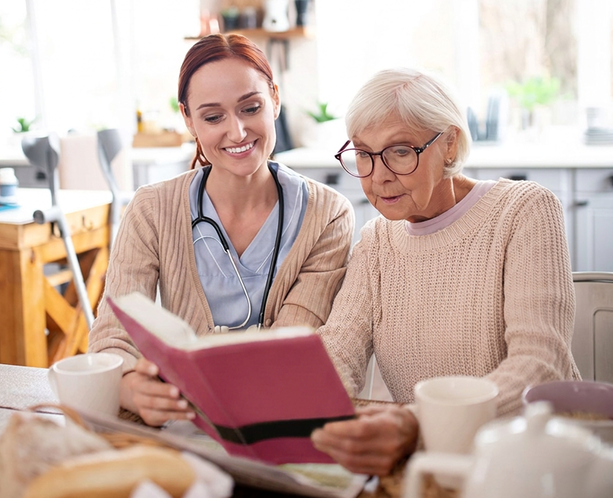 Registered nurse assessing an elderly woman at home